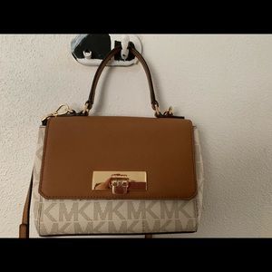 A small Micheal Kors purse